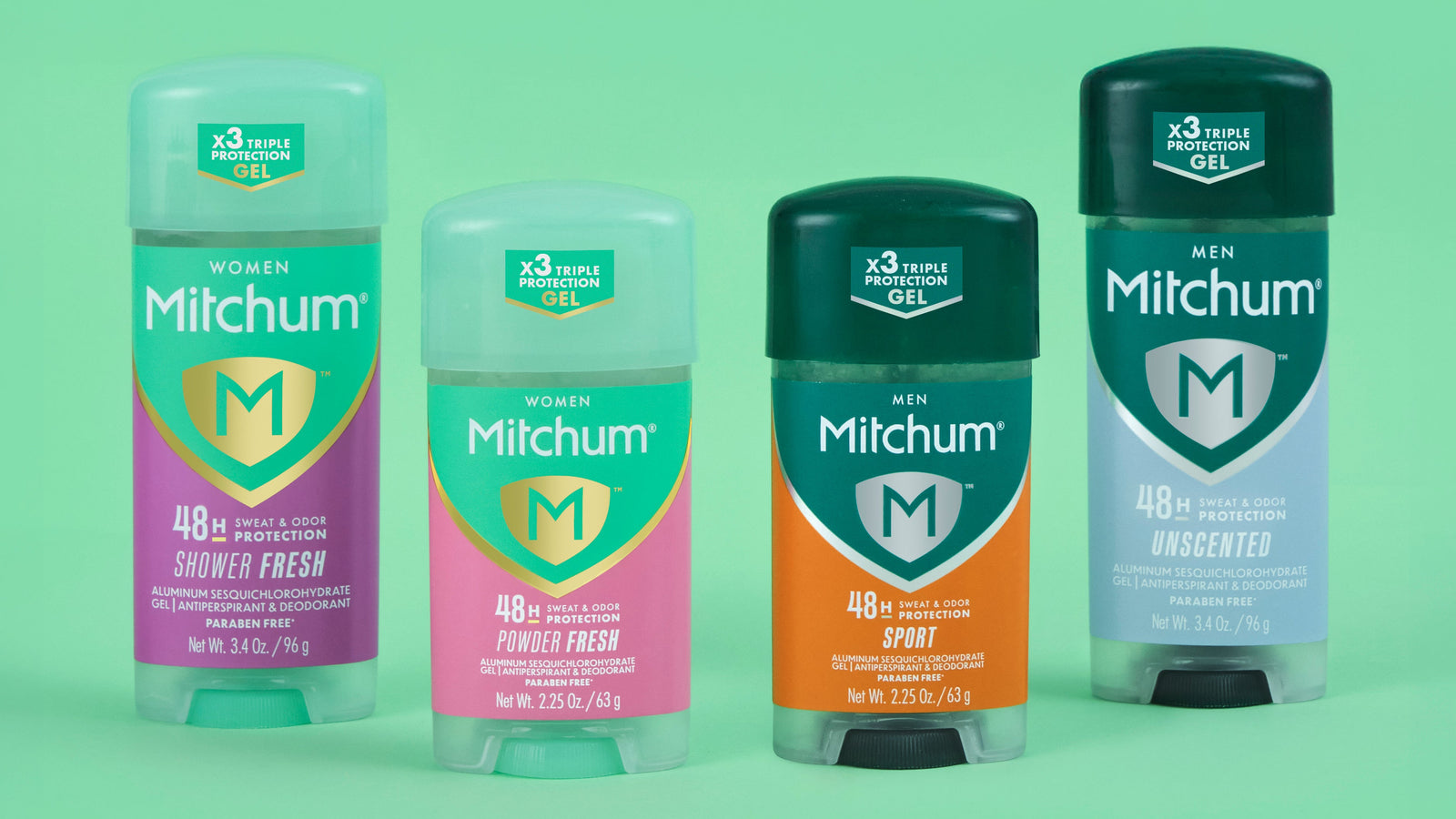 Four Mitchum gel deodorant and antiperspirant bottles on a green background